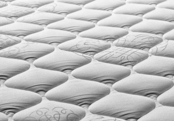 a close up of a mattress that has been made
